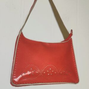 Mondani NY Coral Colored Leather Shoulder Bag With Whimsy Cut-out Details